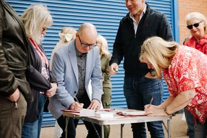 Residents sign the petition to keep the Ladies Walk centre in Sedgley on a day of action called by Dudley MP Sonia Kumar