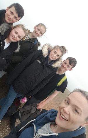 Blake, second right, with, from left, Brandon Harrison, Amy Evans, Michelle Evans, Stephanie Evans, and, Rebecca Ray, far right

