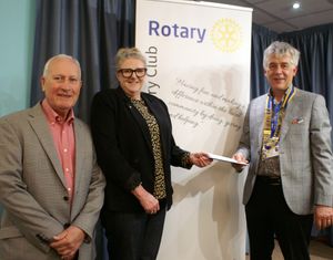 Photo caption: left to right Rotarian Gareth Watkins, Karen Corcoran and Rotarian Johnathan Callwood.