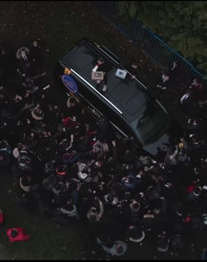 Ste Hamilton giving the trainers away to a huge crowd of school pupils