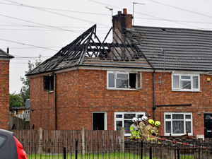 Supporting image for story: House fire in Friar Park, Wednesbury, sparked by overheating phone charger
