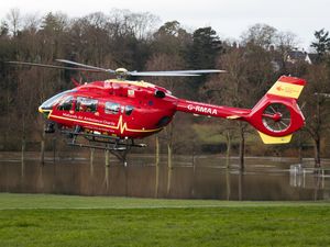 Supporting image for story: Air ambulance and firefighters come to aid of tree cutter stuck under tree near Oswestry