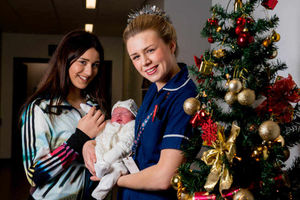Teddy Butler with his big sister Kay Pitt, and delivery midwife Becky Reece