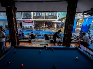 Supporting image for story: Laos hostel owners held over deadly tainted alcohol poisonings