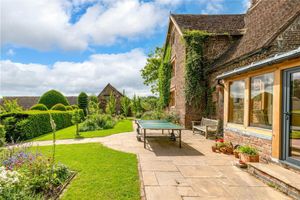 Gardens and outside area at the farmhouse that boasts more than an acre of land, picture: Rightmove and Balfours