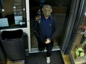 Supporting image for story: CCTV images released after Halloween-masked man attempted to rob Telford Co-op