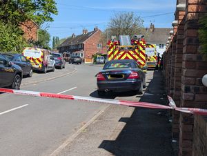 West Midlands Police and West Midlans Fire remain at the scene of a blaze in Bloxwich