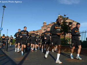 Supporting image for story: Wolves players surprise commuters with city centre run