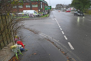 A man was arrested at the scene of the crash which claimed two lives