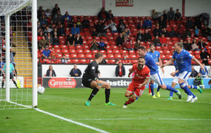 Erhun Oztumer's late strike sealed Walsall's win over Oldham.