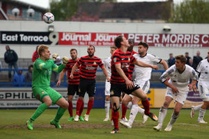 Adam Farrell of AFC Telford United scores a goal to make it 1-1 against Wrexham.