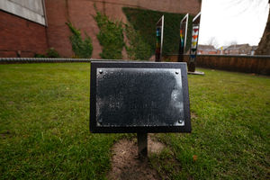 Damaged by what appears to be spray paint.