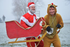 Matthew Seal dressed as Santa as Ian Rowlands took on the role of Rudolph in the cold.