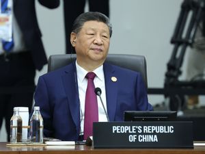 Supporting image for story: China’s Xi promises to protect free trade at Apec as Trump snubs major summit