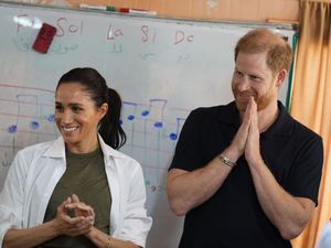 Supporting image for story: One-nil to Meghan after visit to refugee camp football class with Harry