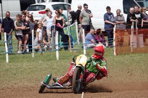 Shaun powers round the corner while Louis holds on