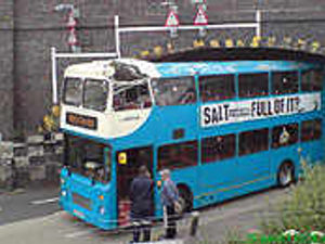 Supporting image for story: Bus in collision with bridge
