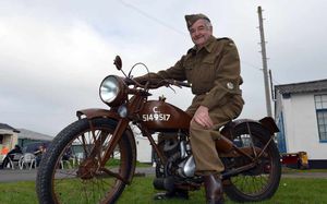 Don Highman is pictured on his 1943 125cc James Lightweight Military Motorcycle