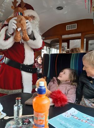 Annabelle and her nanny could not hide their delight when Santa turned up