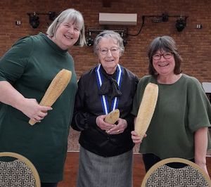 Elaine, with Chairman Chris Ballett and Julia showing proudly their Loofah - which Monty Don is unable to grow. (L to R)
