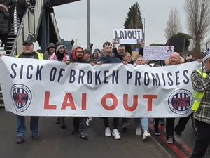 Supporting image for story: 'Lai out': Thousands of West Brom fans hold protest march against club owner Guochuan Lai - WATCH