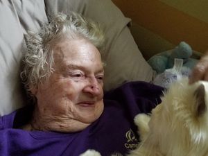 Supporting image for story: This woman's reaction to being given a robot cat will melt your heart