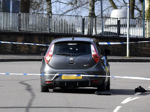 Bullet holes could be seen in the back of an MG on Paget Road, Wolverhampton, after a suspected targeted attack