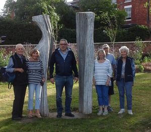 Members of the Ellesmere sculpture group with Gareth Nick Eames’ abstract sculpture representing the Jebb sisters