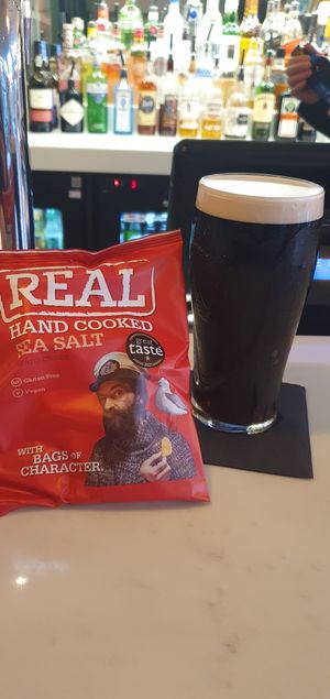 You can enjoy a Guinness and bag of crisps at the bar