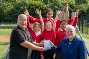 Richard Thorpe, headteacher at Grange Park Primary School, with school pupils and Councillor Shirley Reynolds