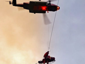 Supporting image for story: Two men rescued in five-hour operation after drunken party on mountain