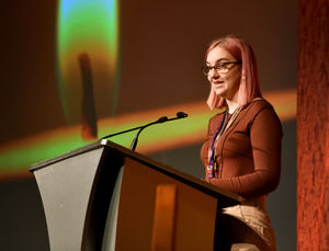 Student Cassidy Woodrow read Lesson From Auschwitz as part of the event