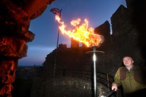 The beacon at Dudley Castle, with Dudley Zoo manager Matt Lewis