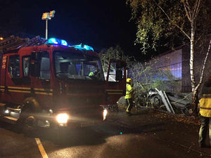 Supporting image for story: Three injured in Cradley as crashed car ends up in tree