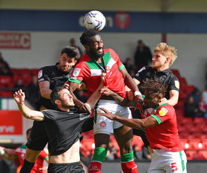 Manny Monthe gets to the ball