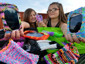 Supporting image for story: Mini  entrepreneurs make loom band phone cases