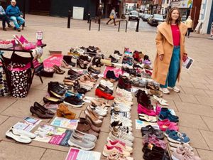 Supporting image for story: Newport woman lays out 100 pairs of shoes to mark lives lost to male violence
