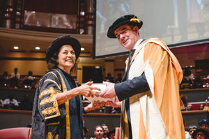 BCU Chair Anita Bhalla OBE alongside Dr Graham Herries at Birmingham's Symphony Hall