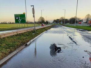 Supporting image for story: A41 repairs expected to be complete this weekend after burst pipe damages road
