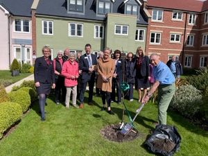 Supporting image for story: Residents plant a tree a Ludlow retirement complex for the Queen's Jubilee