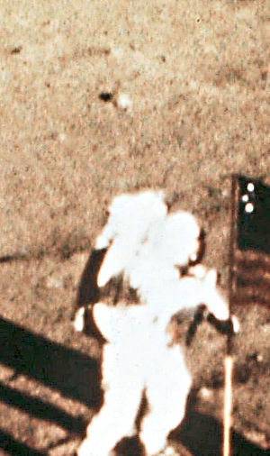 Neil Armstrong and Edwin 'Buzz' Aldrin plant the US flag on the moon. But did it really happen?