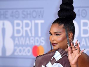 Supporting image for story: Lizzo insists she is not quitting the music industry