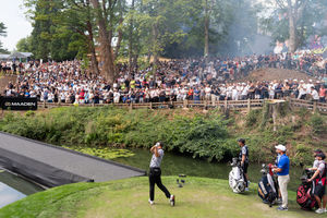 Large crowds gather at the first hole to watch Dustin Johnson tee off. Picture: LIV Golf