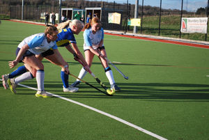 Stourport defender thwarts Leek.