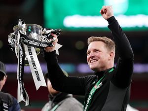 Newcastle head coach Eddie Howe celebrates with the trophy after Carabao Cup final victory over Liverpool