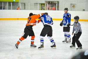 Tigers Owen Bennett and Steeldogs Callum Pattison trade blows. Photo - Matt Giles
