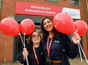 Staff members Lyn Baker-Sherman and Pooja Singh celebrate