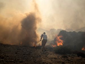Supporting image for story: More Britons returning from fire-ravaged Rhodes on repatriation flights