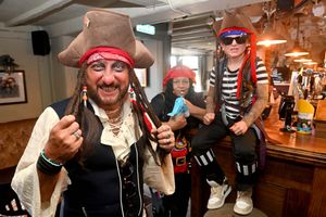 The Cross Pub in Oldbury held its annual Pirate Treasure hunt t0 raising money for charity. Sam Drackard, Tracie McPherson, Sebastian Westerland (on bar), aged 8.
