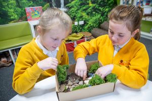 B&DWM - SGB-57412 - Two competition winners perfecting a Garden in a Shoebox
